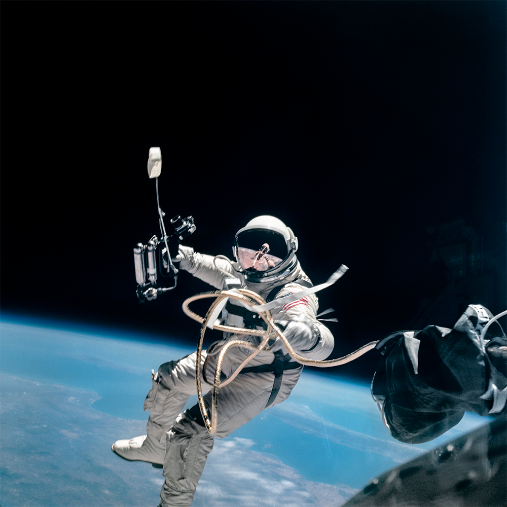 Ed White completes the first US space walk. 